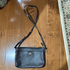Large brown Coach crossbody bag